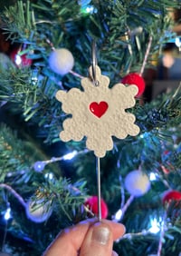 Image 3 of Snowflake with a heart on a wire stake 