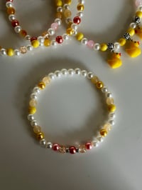 Image 5 of Rubber Ducky Tumbler Bracelet Stack – Yellow Duck Beaded Cup Charm Set