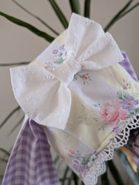 Image 2 of READYMADE 12-18 MONTHS pastel lemon and lilac floral bunny bonnet 