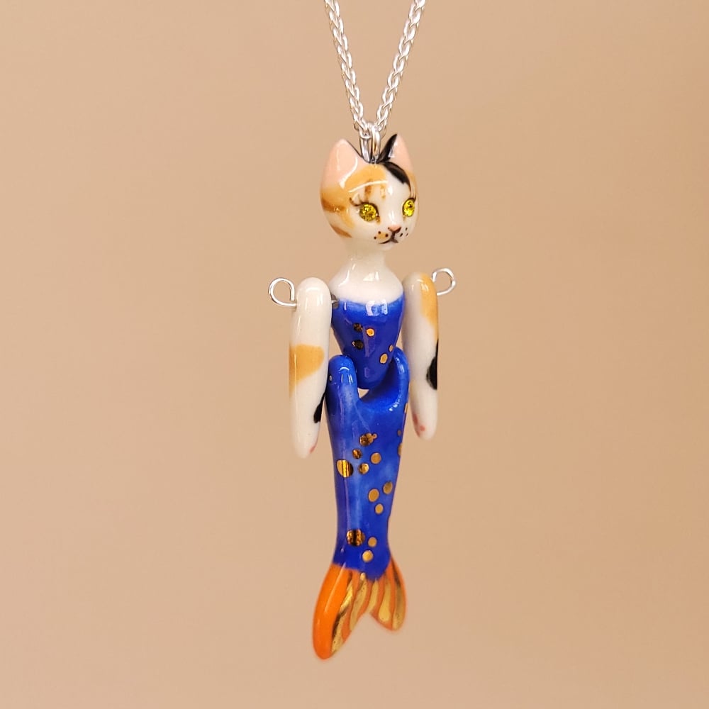 Image of Calico Porcelain & Sterling Silver Articulated Purrmaid Pendant