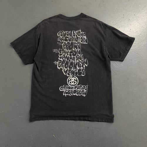 Image of Stussy x Kaws t-shirt, size Large