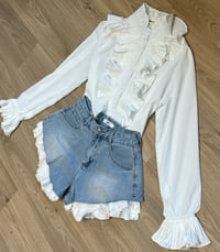Image 1 of Frill hem denim shorts 