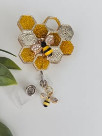 Image 3 of honey comb badge reel 