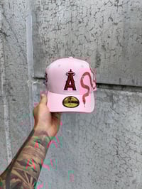 Image 1 of  RED BRIM PINK DOUBLE SNAKE ANEHEIM ANGELS CUSTOM FITTED CAP