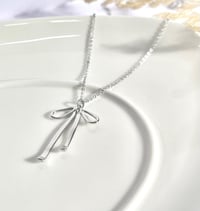Image 2 of “Sleepy” Bow Necklace