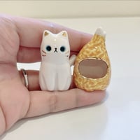 Image 5 of White cat with chicken drumstick ceramic figurine