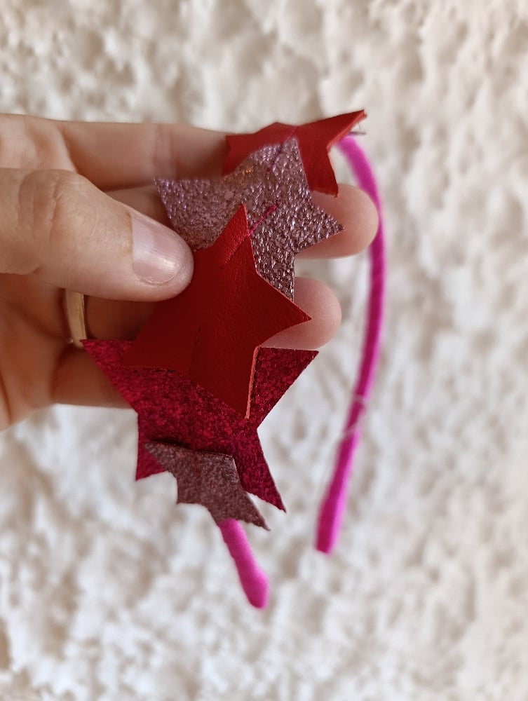 Image of Cerchietto stelle imperfette rosso/rosa