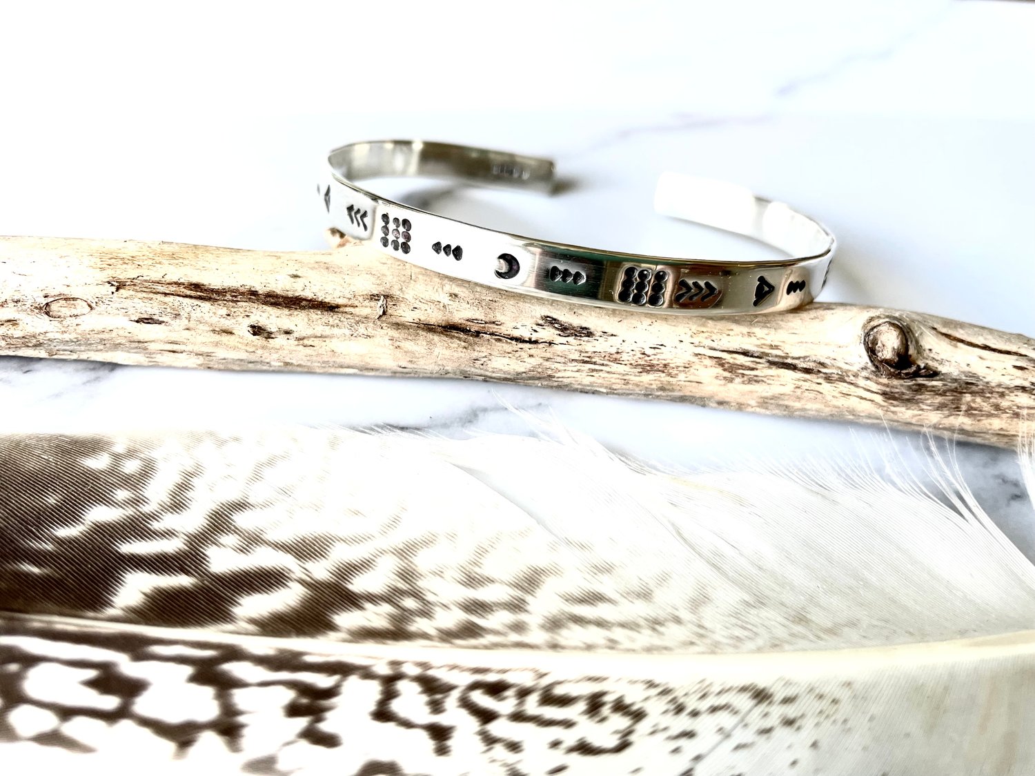 Image of Luna symbol silver stamped cuff bracelet. Handmade crescent moon patterned bracelet (6mm)