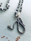 long labradorite necklace with serpent pendant