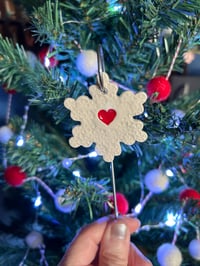 Image 7 of Snowflake with a heart on a wire stake 