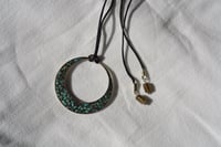 Image 1 of turquoise donut