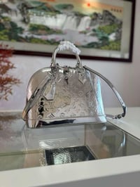 Image 1 of Chrome bags
