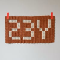 Image 2 of YES in sunset orange