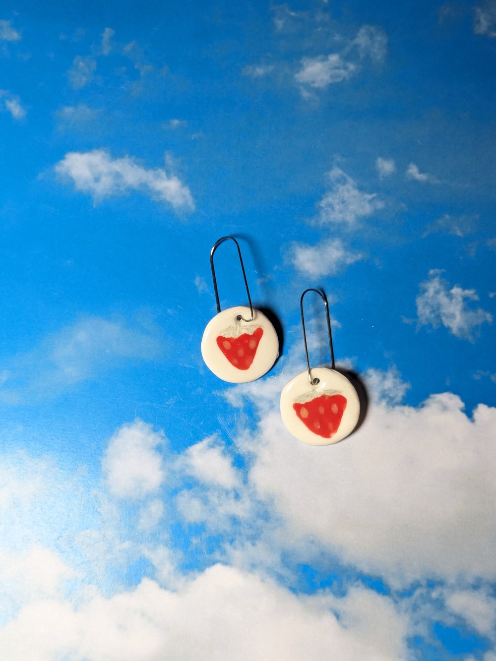 Image of round strawberry earrings