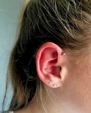 FORWARD HELIX PIERCING SERVICES