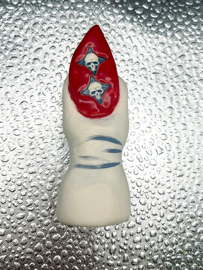 Brown Sugar Keeper Toe With Sharp Red Nail