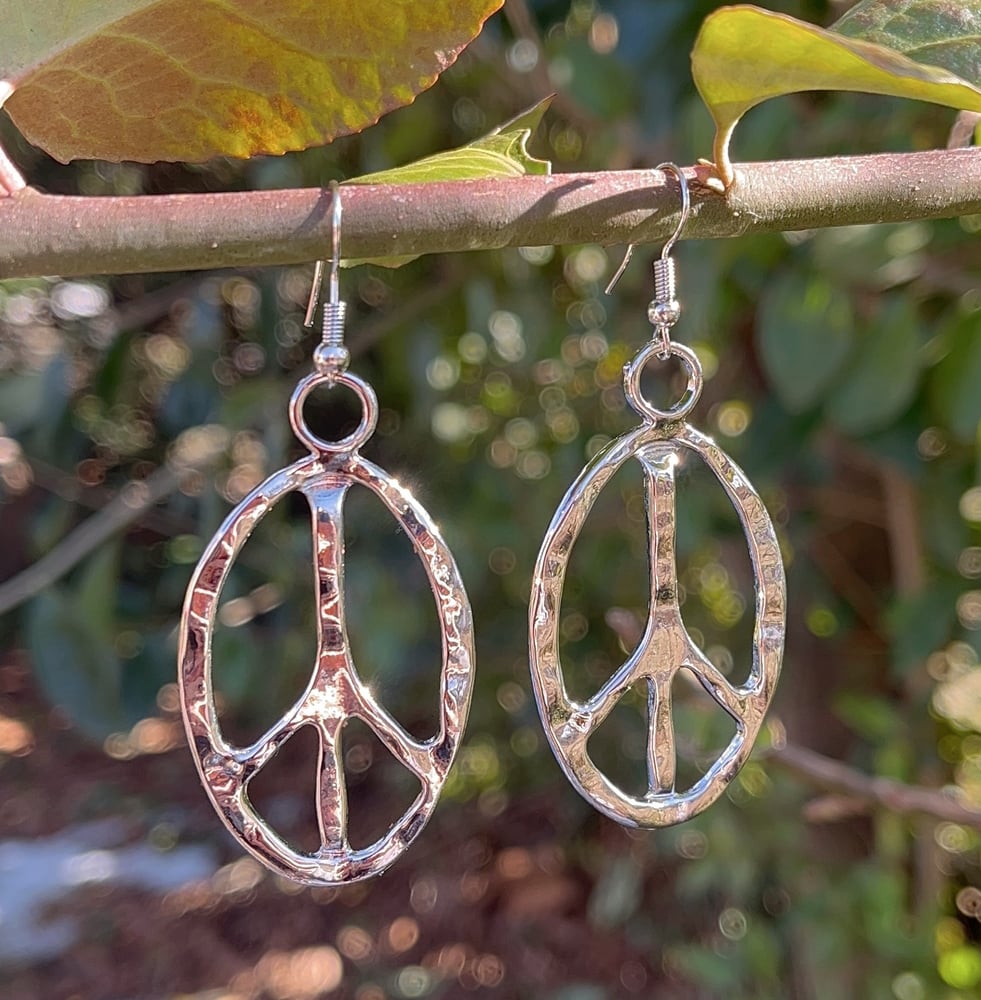 Image of Silver peace sign earrings 