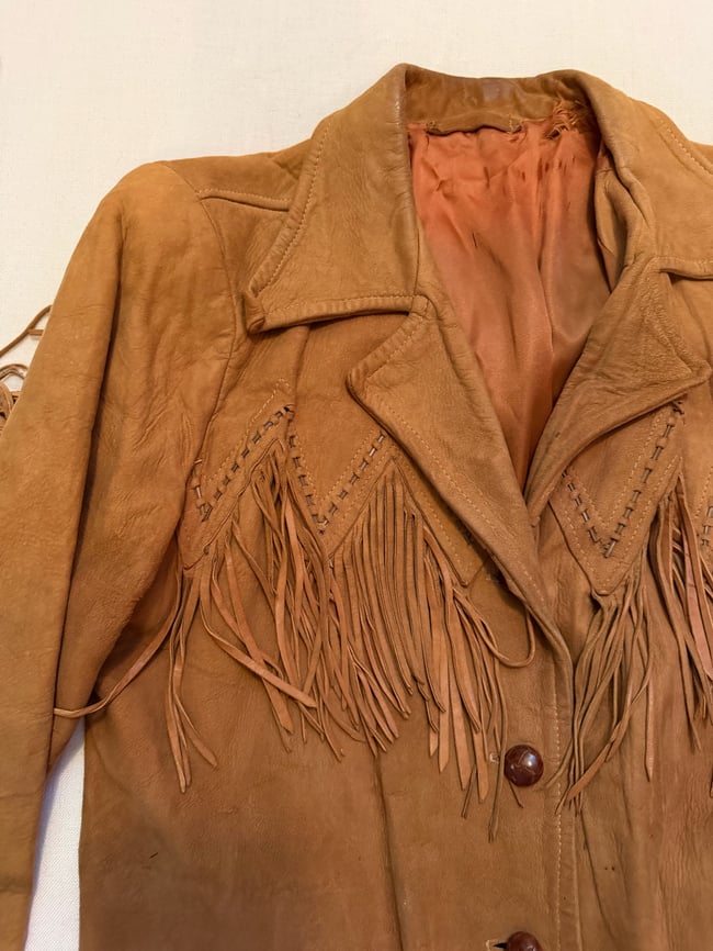 late 60s early 70s buttery leather fringe jacket with whipstitching 