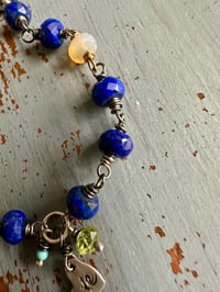Image 22 of lapis and peridot charm bracelet