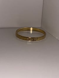1 gold  bangle 