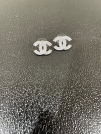 luxury silver CC earrings 