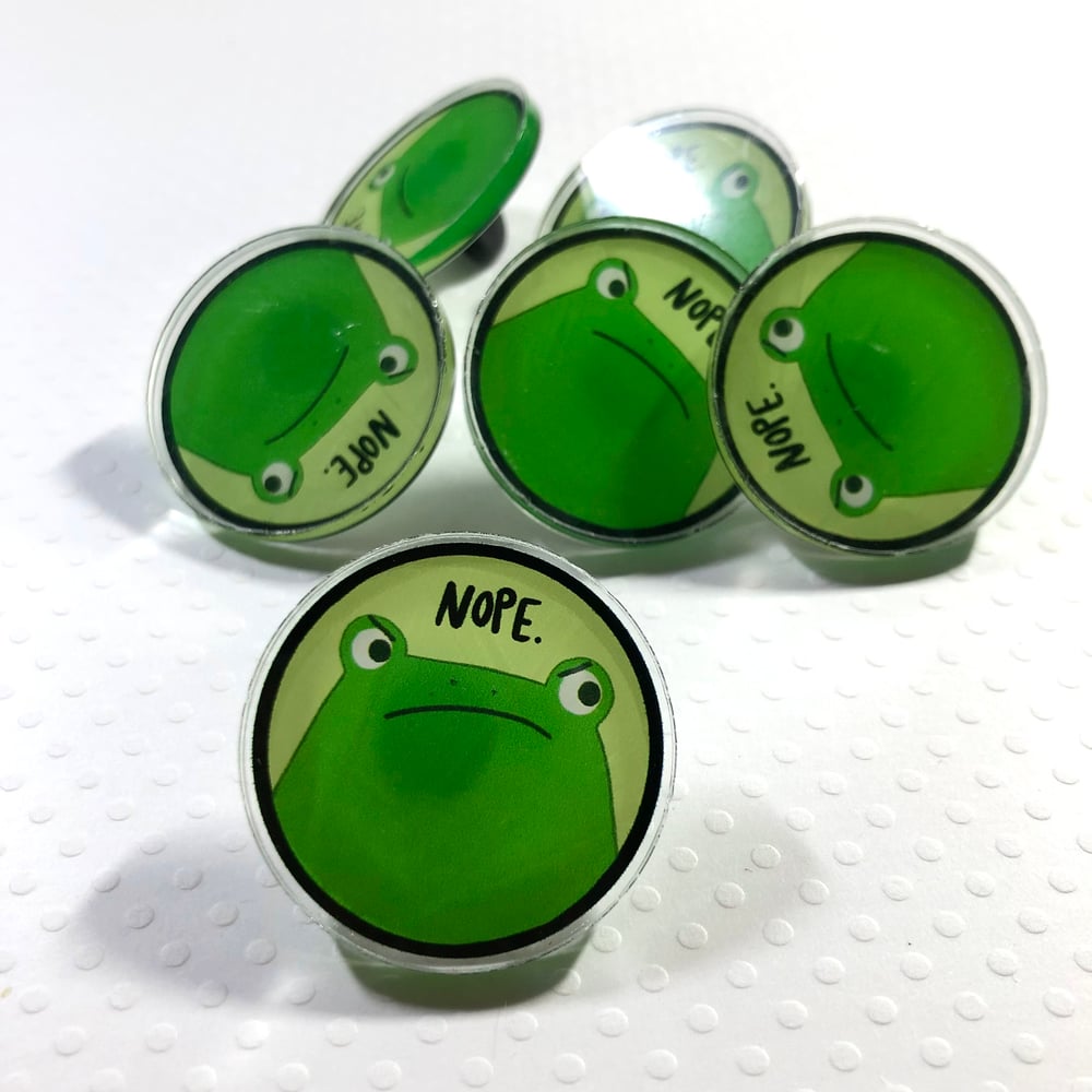 Image of NOPE frog clear acrylic pins 