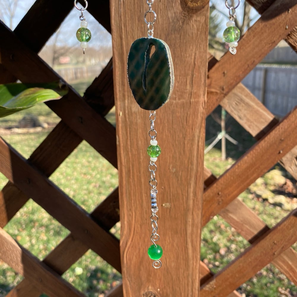 Image of malachite flight sun catcher 