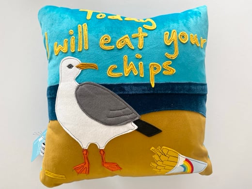 Raggy Roux - ‘today I will eat your chips’ seagull cushion 