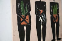 Image 2 of A group of three