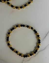 Image 7 of Black & Gold Fairy Dust Tumbler Bracelet Stack