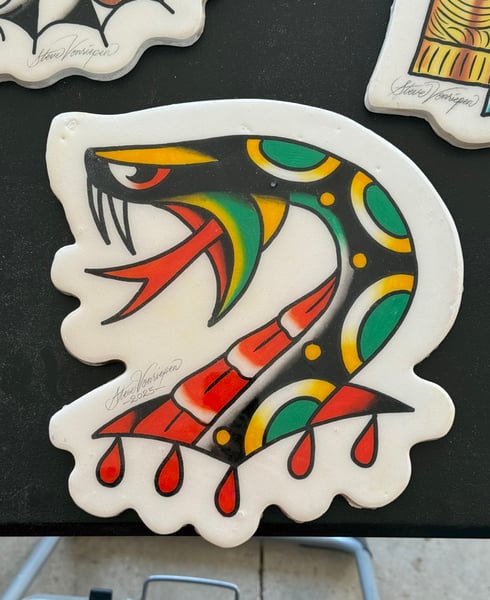 Image of Wood sign / snake 