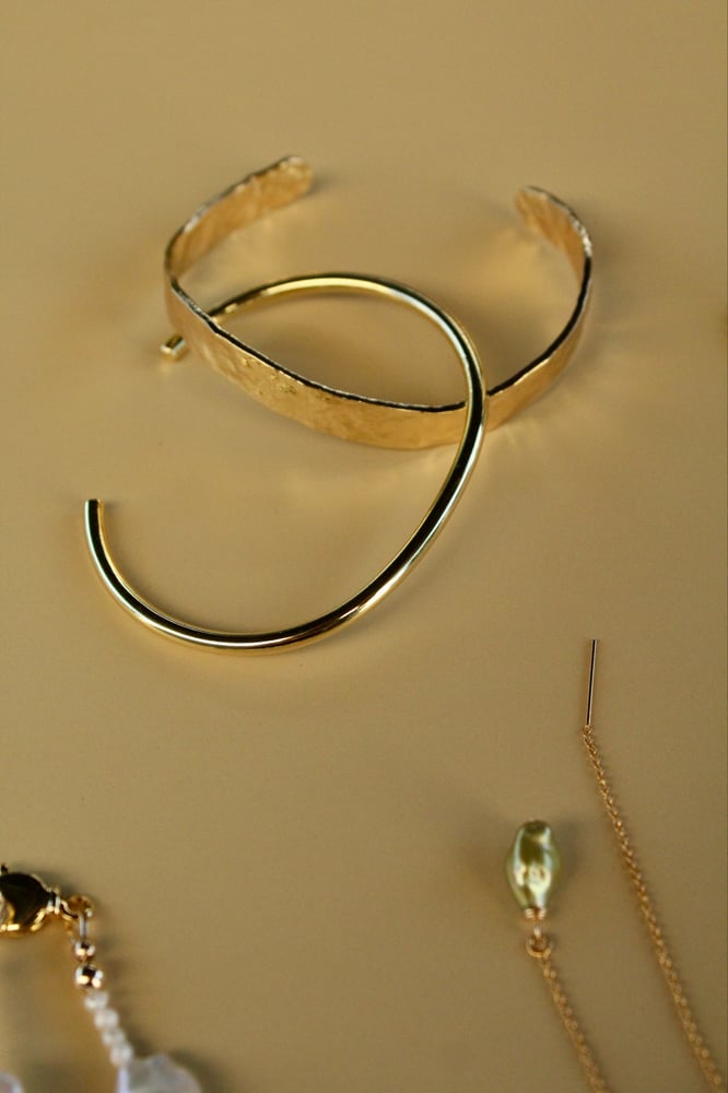 Image of Gold wrist cuffs