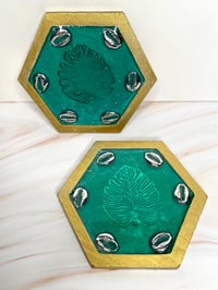 Image 1 of “Emerald Oath” – Cowrie & Monstera Hex Resin Coaster Duo