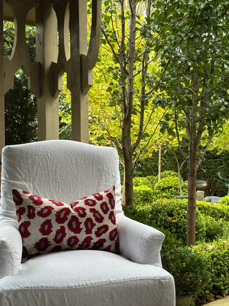 Image of Unexpected Red & Blue Leopard Ikat Cushion