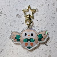 Image 1 of Rowlet double sided charm