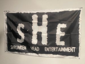 SHE ENT. FLAG 