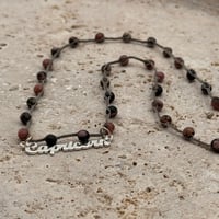 Image 1 of Pink Zebra Capricorn Necklace