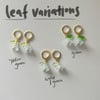 light blue glass flower gold huggie hoop earrings 