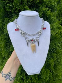 Image 2 of “bite your lip” tooth fairy necklace 
