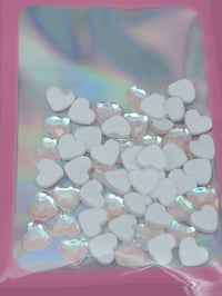 Image 1 of translucent pink heart 