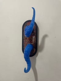 Image 1 of Blue  tentacles on black oval base with sprinkles 