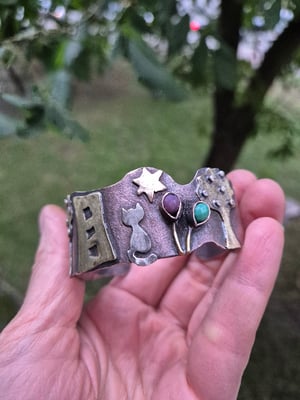 Copper bracelet with trees, houses, cat and star