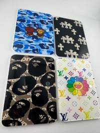 Image 1 of brand tiles 