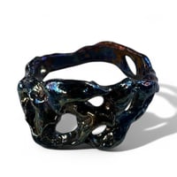 Image 1 of The Oil Spill Ring
