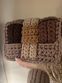 Small brown woven bag