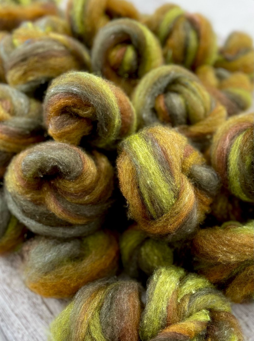 4 oz. • Bitter Herb Sock blend roving: on, 80% Dorset Horn, 10% Kid Mohair, 10% silk