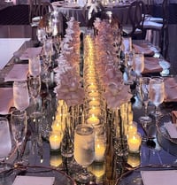 Image 1 of Flower runners with floating candles and two rectangular tables, No luxury chairs included 