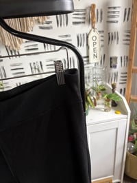 Image 3 of Black sweats with slits 