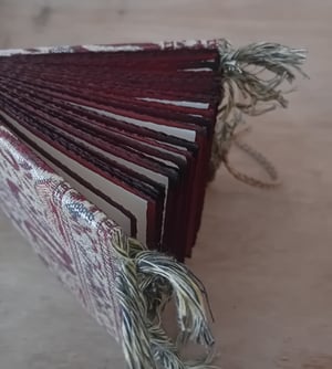 ARIÉ — reliure copte