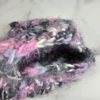 Image 3 of pink/black ponytail crocheted hat
